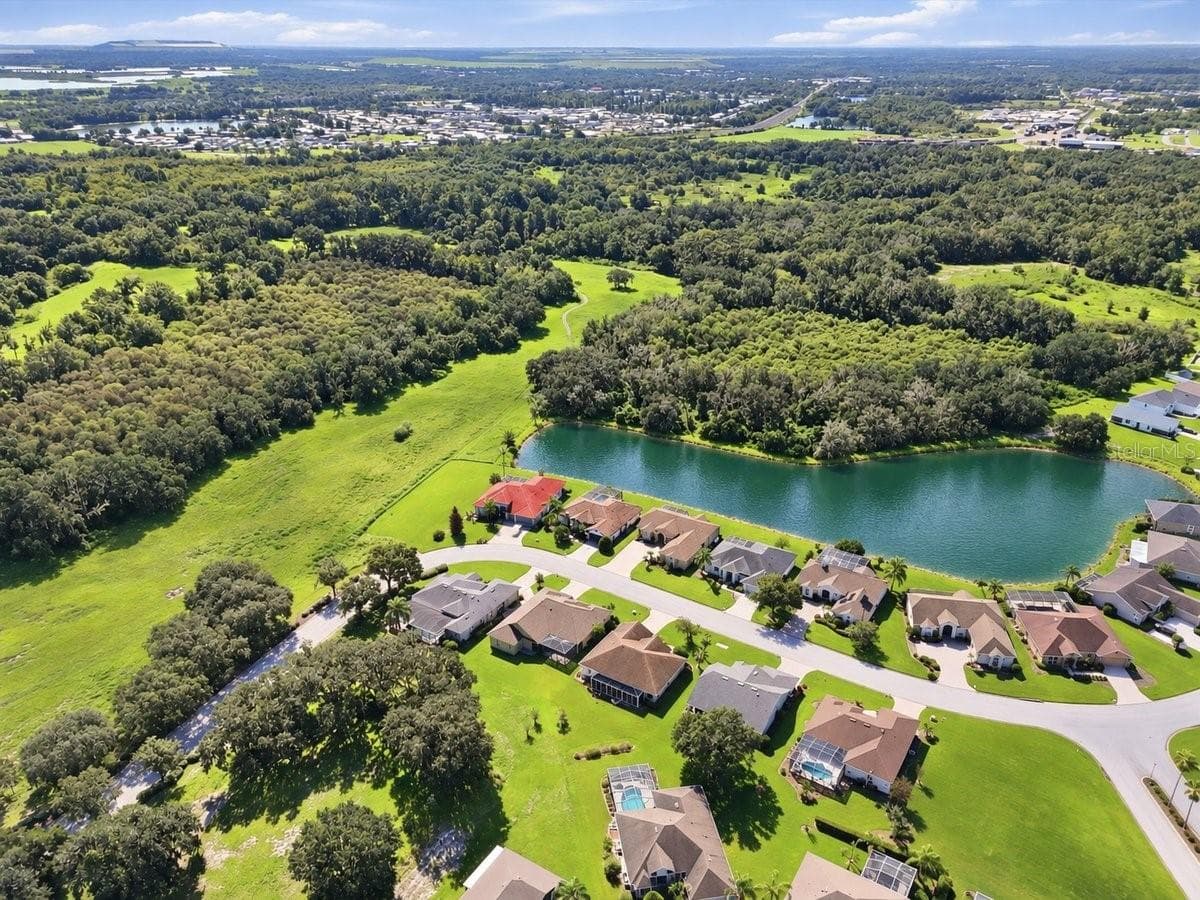 Pond is AI generated - 4458 FAIRWAY OAKS DR, MULBERRY