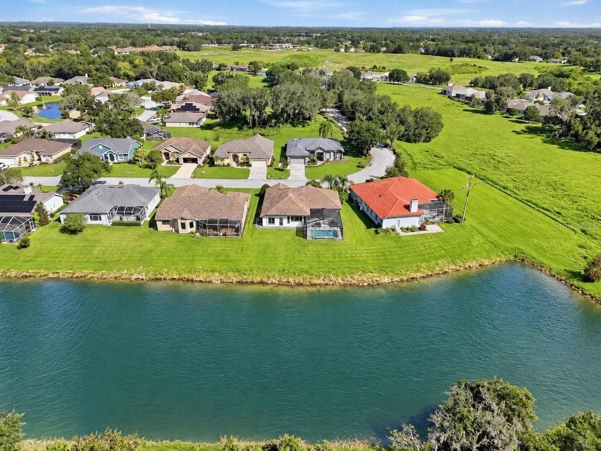 Pond is AI generated - 4458 FAIRWAY OAKS DR, MULBERRY