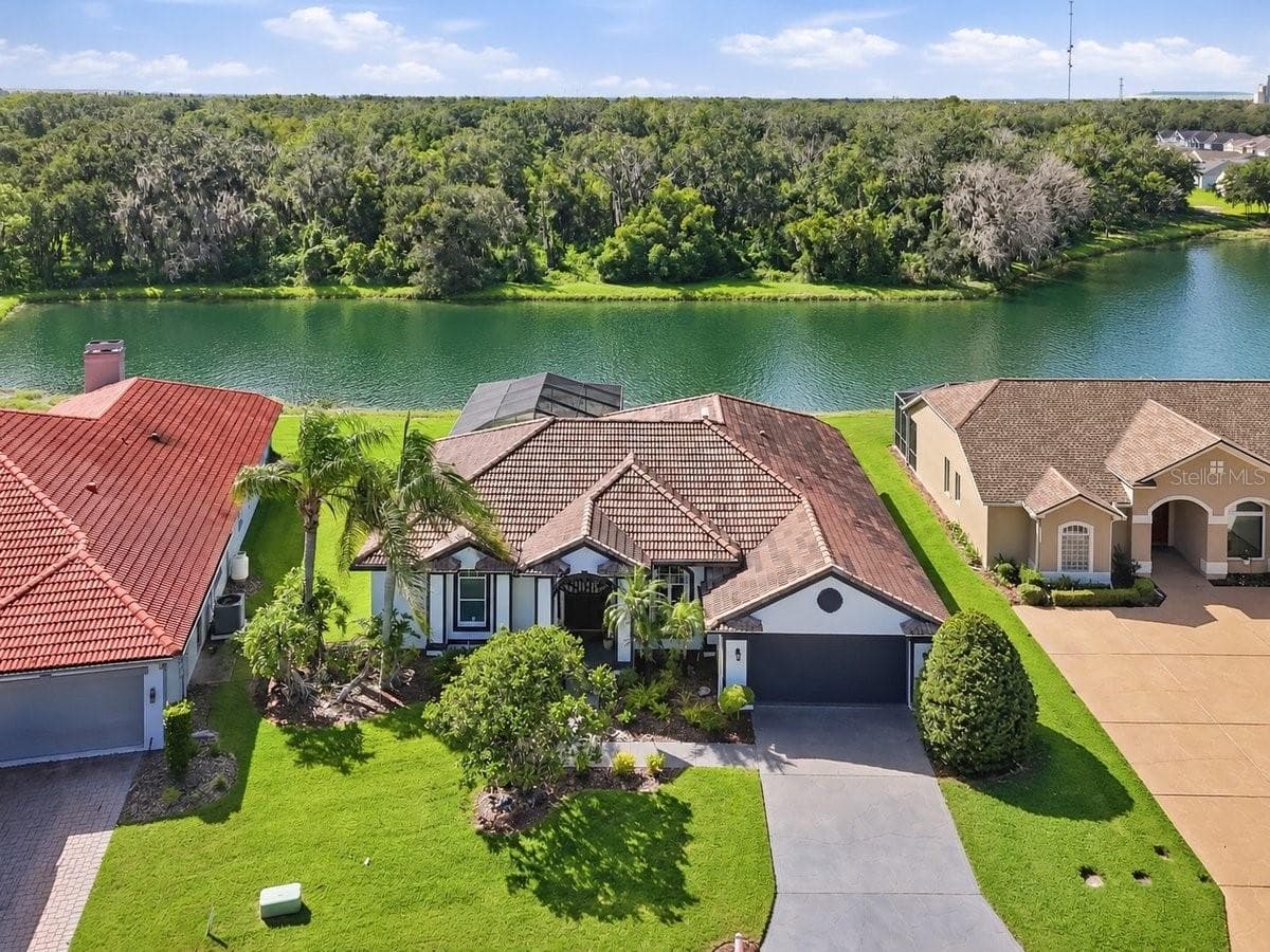 Pond is AI generated - 4458 FAIRWAY OAKS DR, MULBERRY