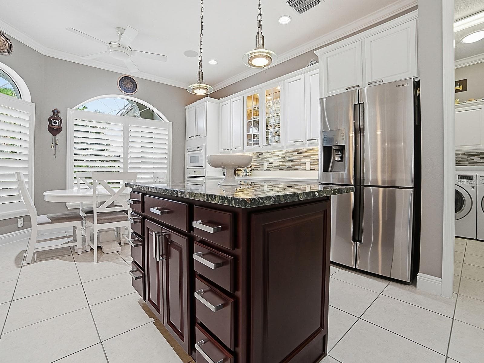 THIS KITCHEN IS LARGE ENOUGH FOR AN ISLAND (MOVABLE IF DESIRED) WITH PENDANT LIGHTING, AND NEWER BOTTOM FREEZER REFRIGERATOR. - 1897 HARTFORD PATH, THE VILLAGES