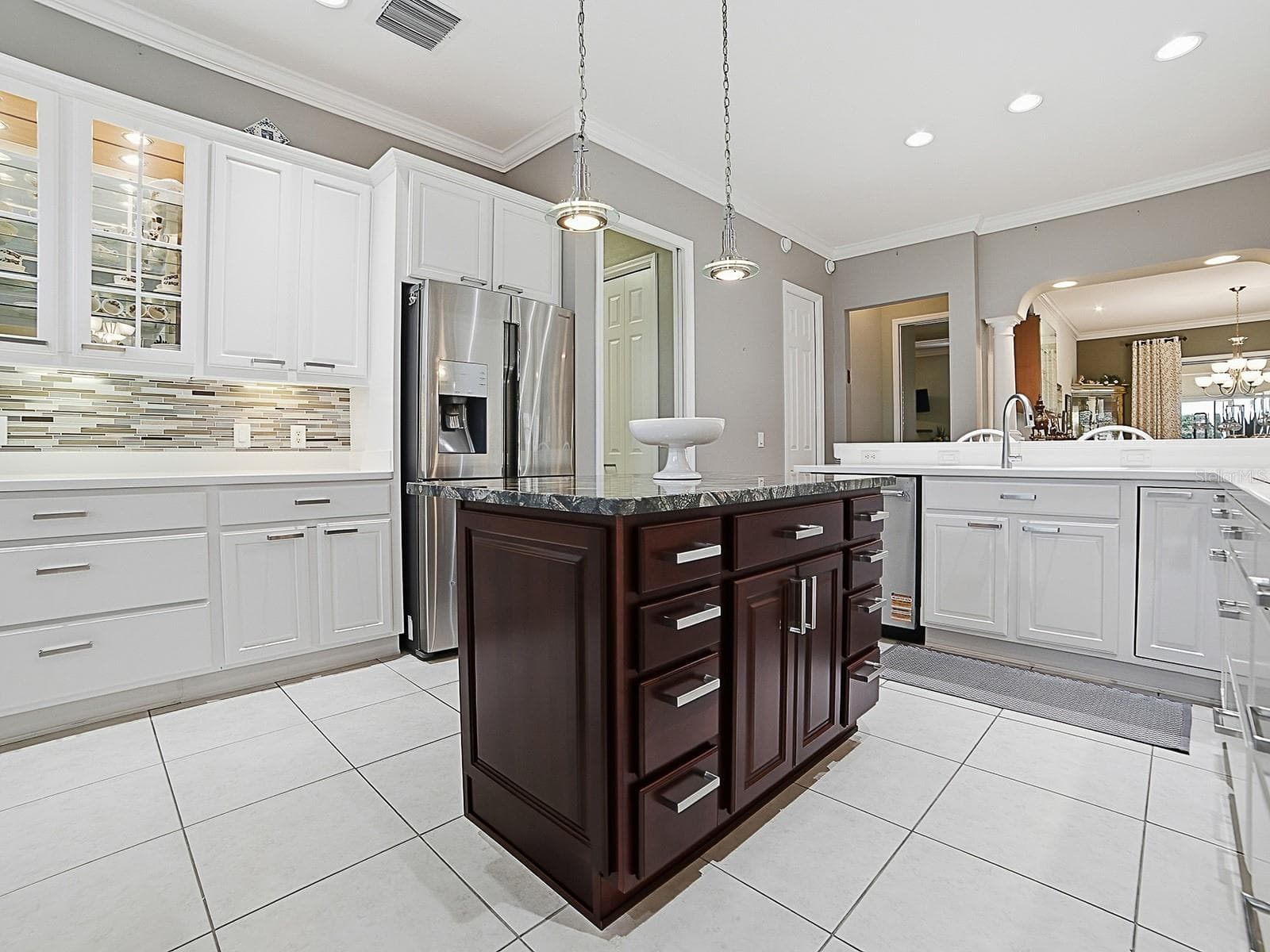NEWER STAINLESS DISHWASHER, AND CORIAN COUNTER TOPS. - 1897 HARTFORD PATH, THE VILLAGES