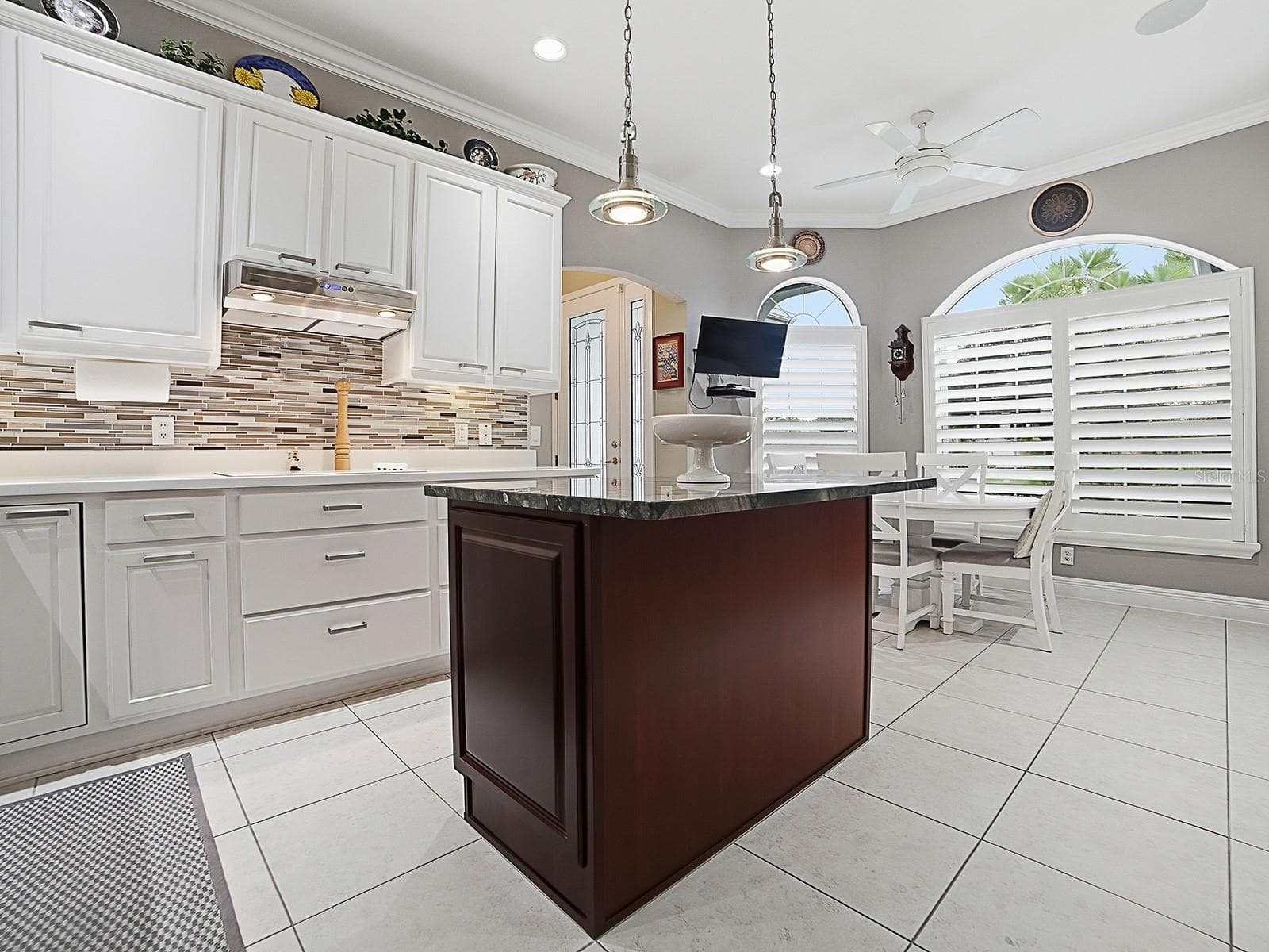 AN ELECTRIC COOKTOP WITH VENT HOOD, AND SO MUCH MORE STORAGE SPACE. - 1897 HARTFORD PATH, THE VILLAGES