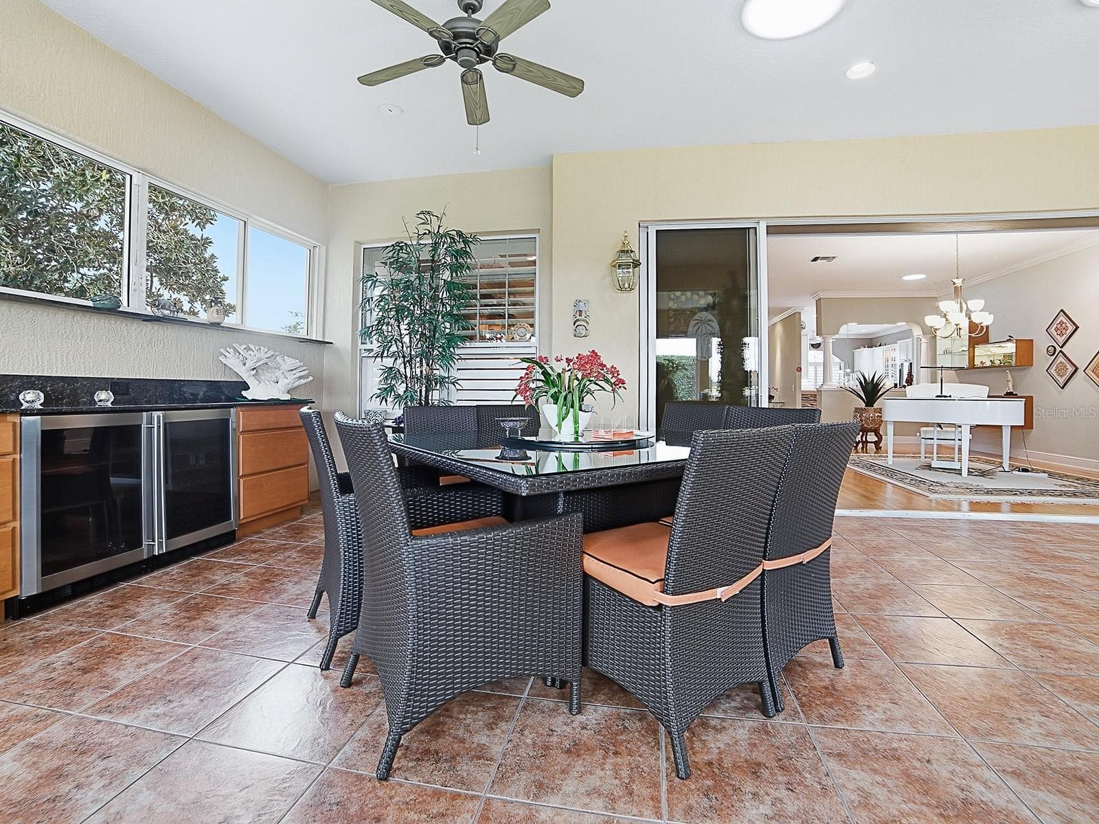 CARDS ANYONE? GATHER WITH FAMILY AND FRIENDS. CONVENIENT BEVERAGE COOLERS AND COUNTER SPACE. - 1897 HARTFORD PATH, THE VILLAGES