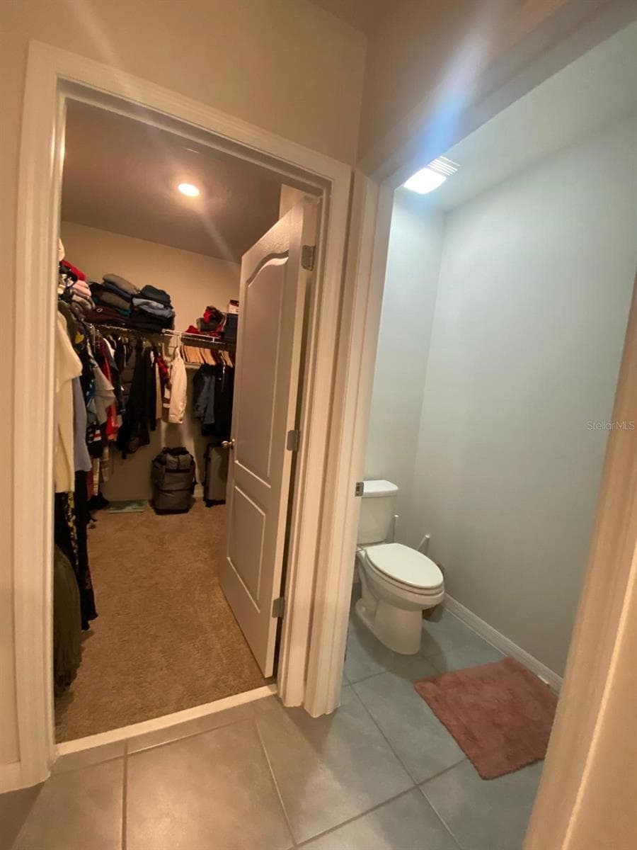 walk in closet - 2723 SUNKISSED DR, ST CLOUD