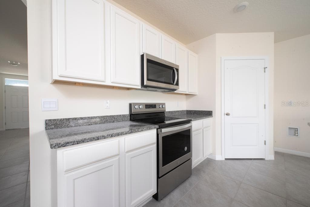 Kitchen view 2 - 2723 SUNKISSED DR, ST CLOUD