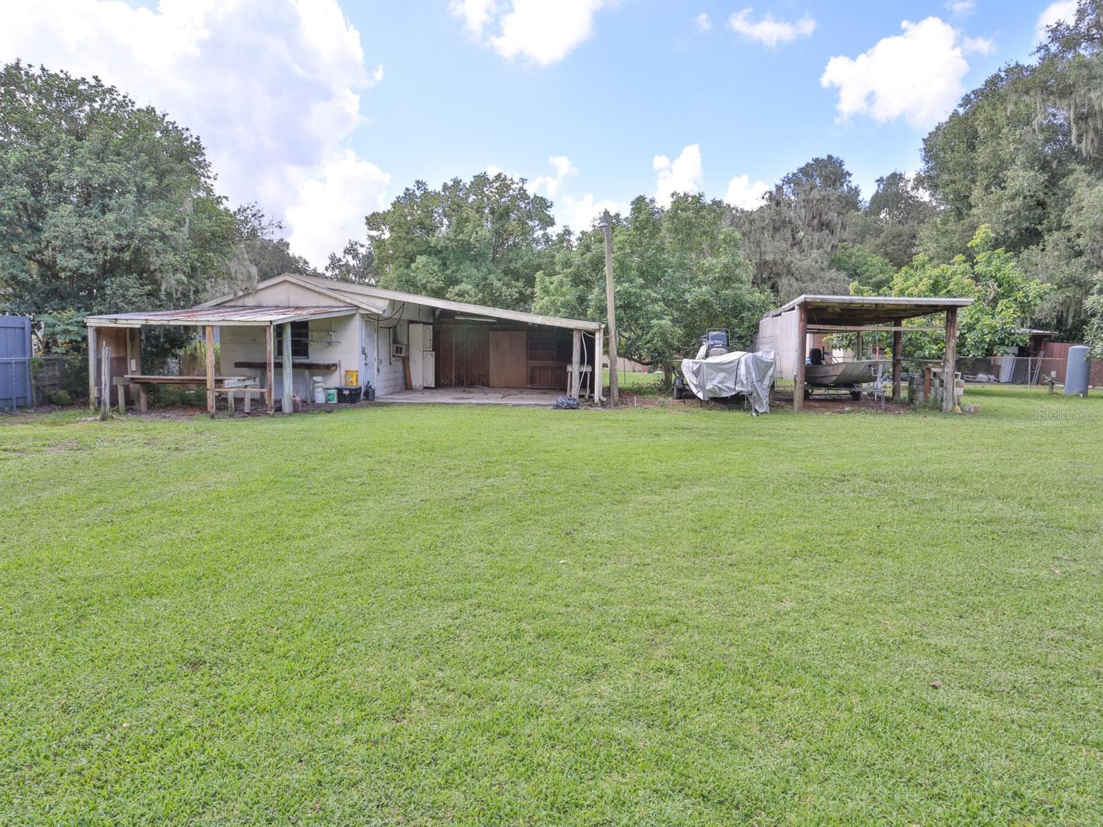 Back yard with 2 sheds. - 3625 E GANDY RD, BARTOW