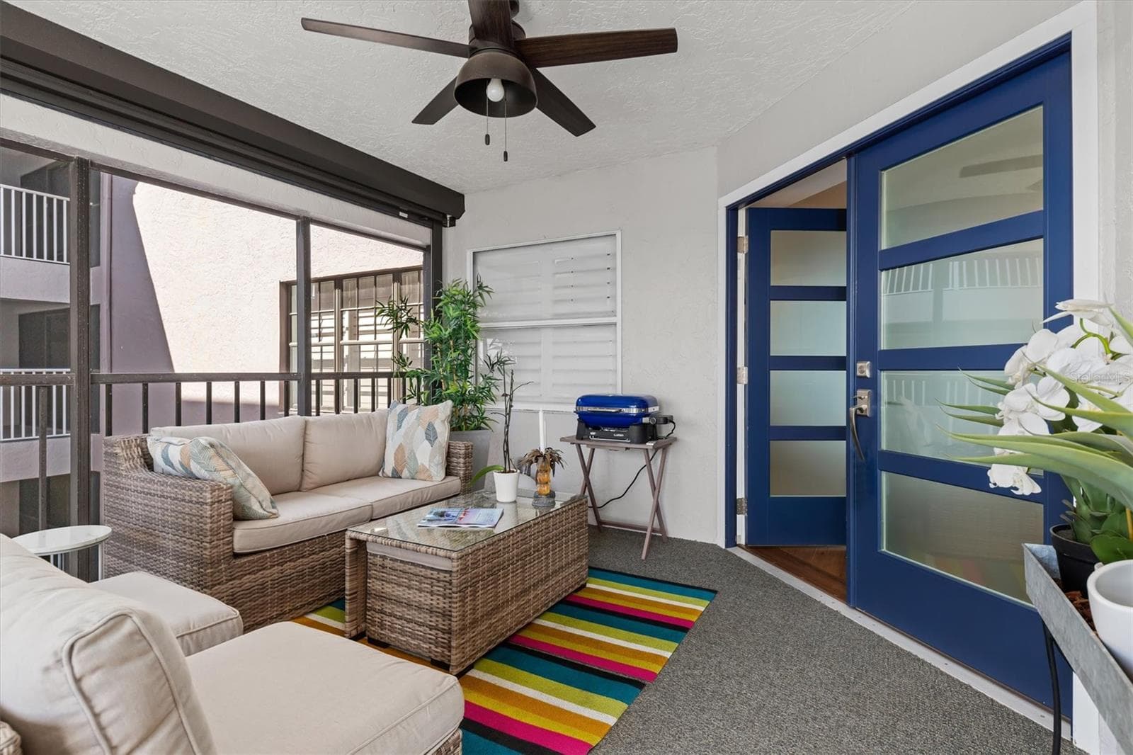 Front lanai offers a relaxing respite - 1600 W MARION AVE #224, PUNTA GORDA