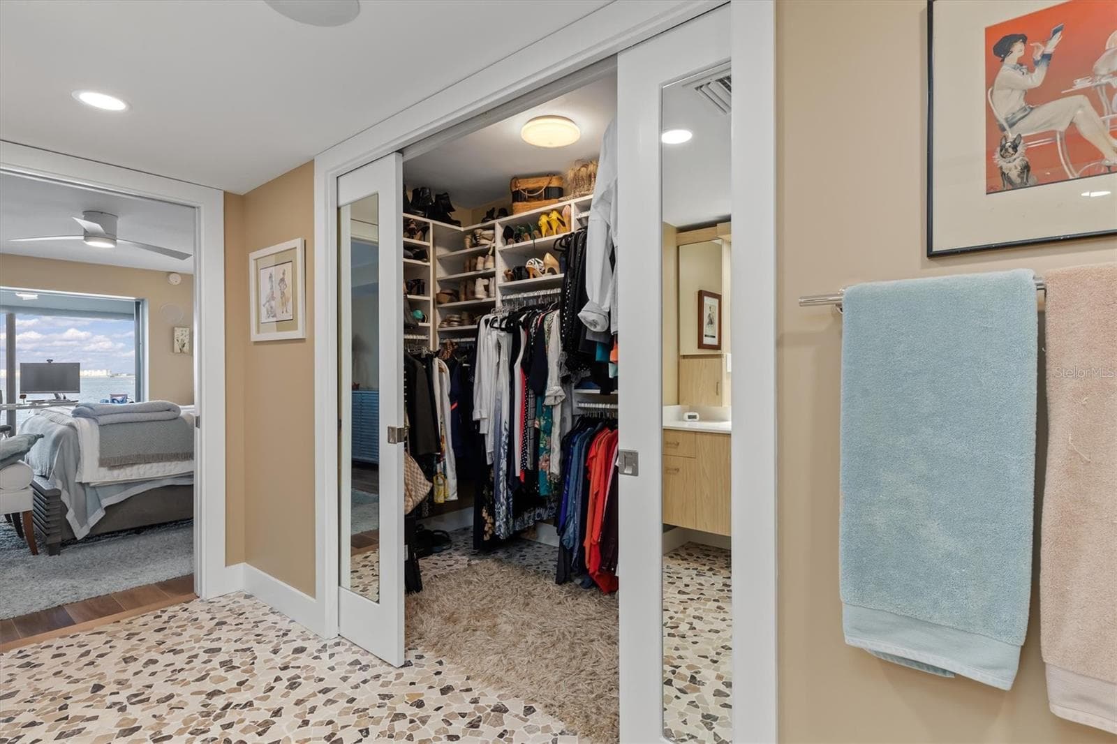 Sliding, mirrored pocket doors to walk in closet - 1600 W MARION AVE #224, PUNTA GORDA