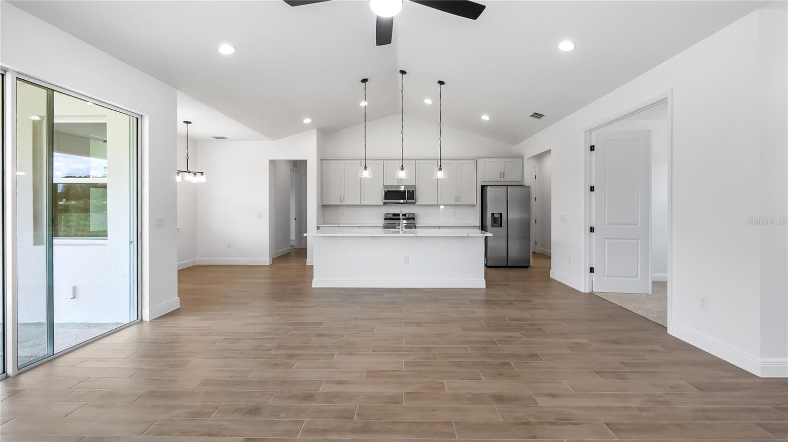 Kitchen from great room - 10720 PHILIPS LANDING CT, WEBSTER