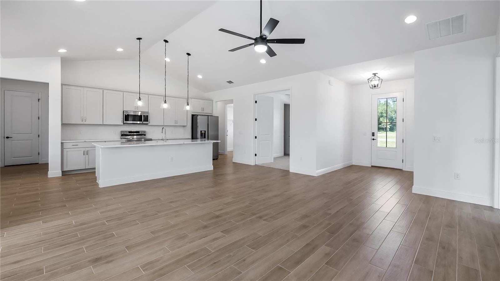 Kitchen from great room - 10720 PHILIPS LANDING CT, WEBSTER