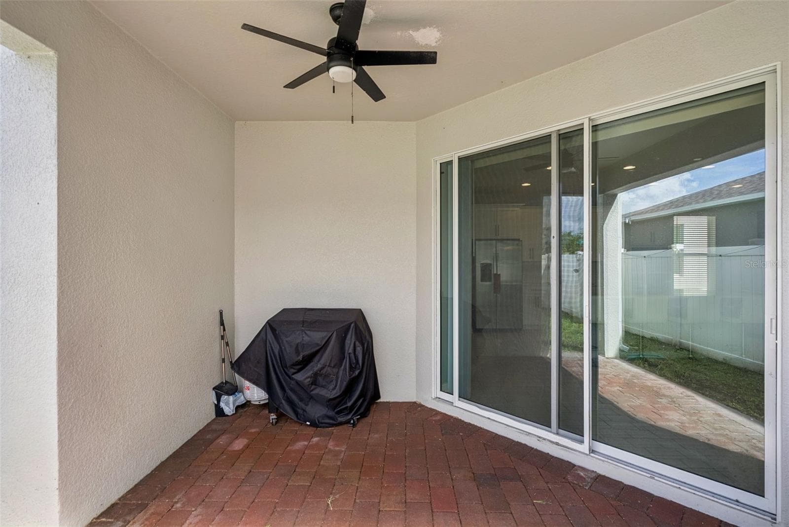 Covered Patio - 613 CHEVAL LN, DEBARY