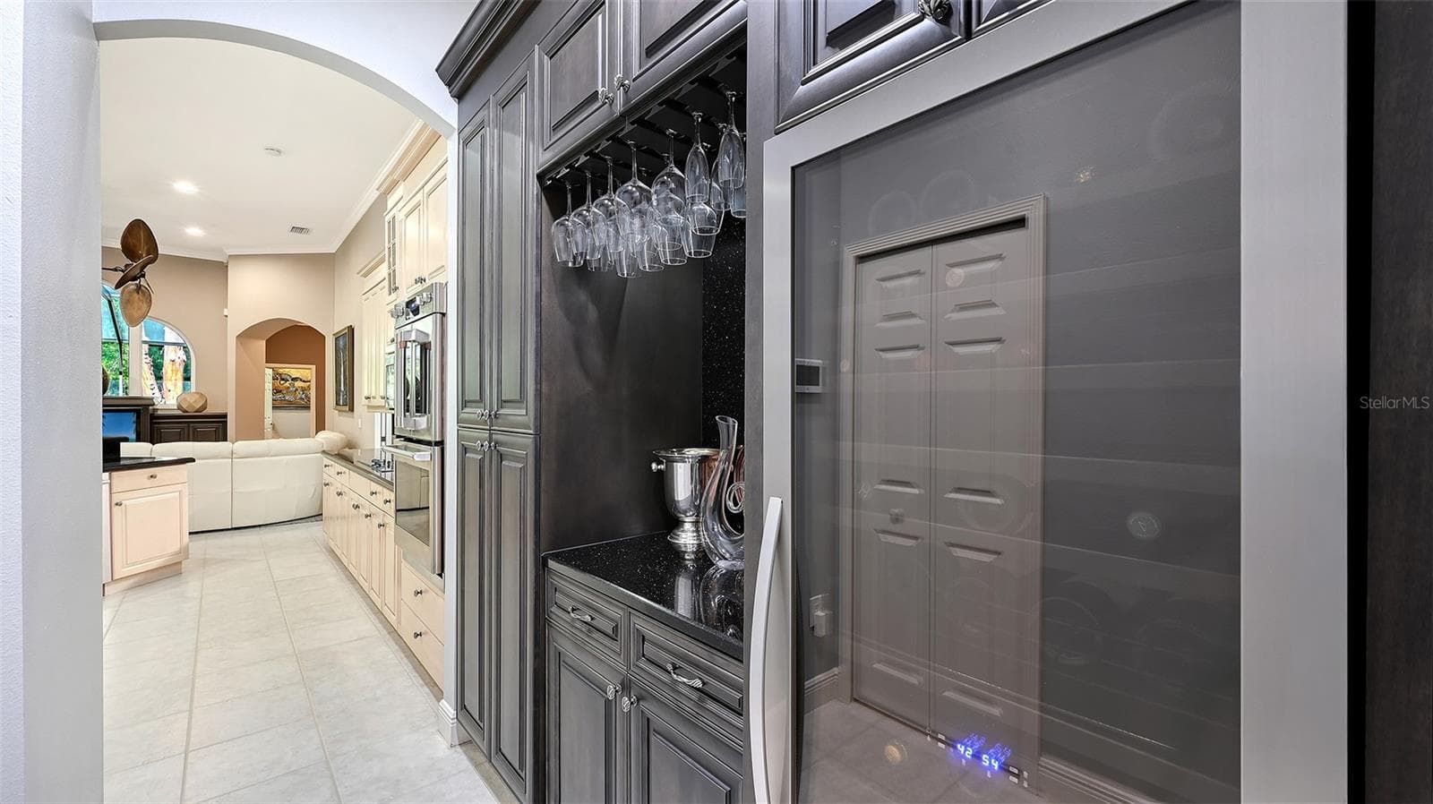 Butler Pantry and Wine Cooler in Kitchen Hallway. - 8866 BLOOMFIELD BLVD, SARASOTA
