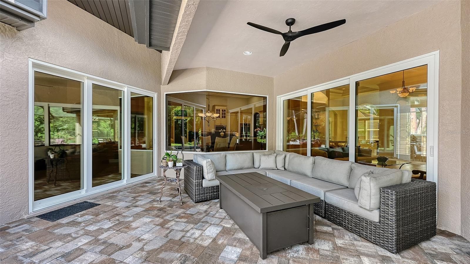 Covered lanai in the pool area. - 8866 BLOOMFIELD BLVD, SARASOTA