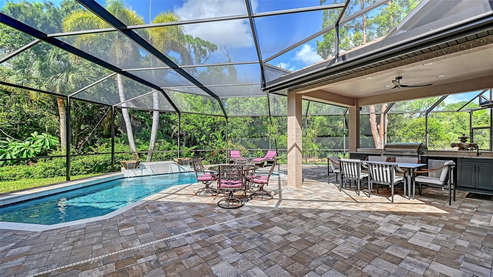 Screened pool area with gazebo and summer Kitchen. - 8866 BLOOMFIELD BLVD, SARASOTA