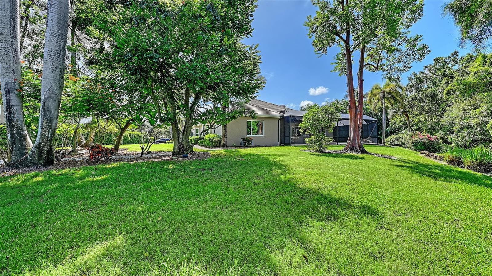 The left side of the home. - 8866 BLOOMFIELD BLVD, SARASOTA