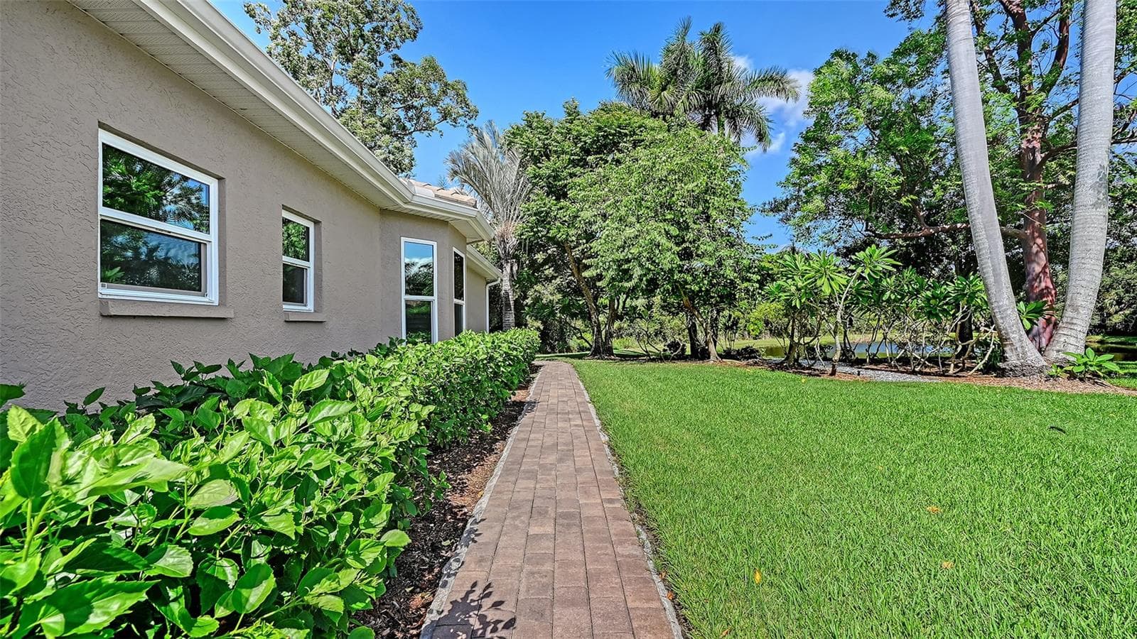 The right side of the home. - 8866 BLOOMFIELD BLVD, SARASOTA