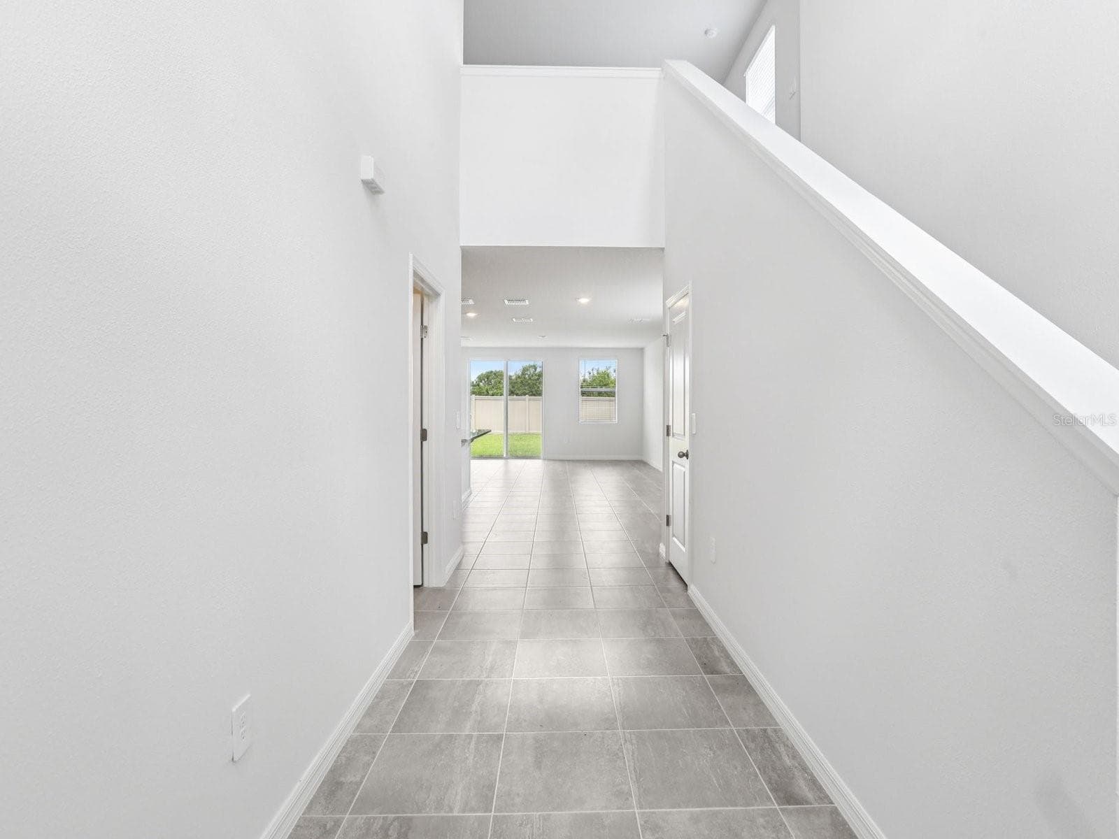 Photo is not of the actual home, but is an inspirational photo of builder’s model home and may depict options, furnishings, and/or decorator features that are not included - 11341 BELLEWOOD TER, PARRISH