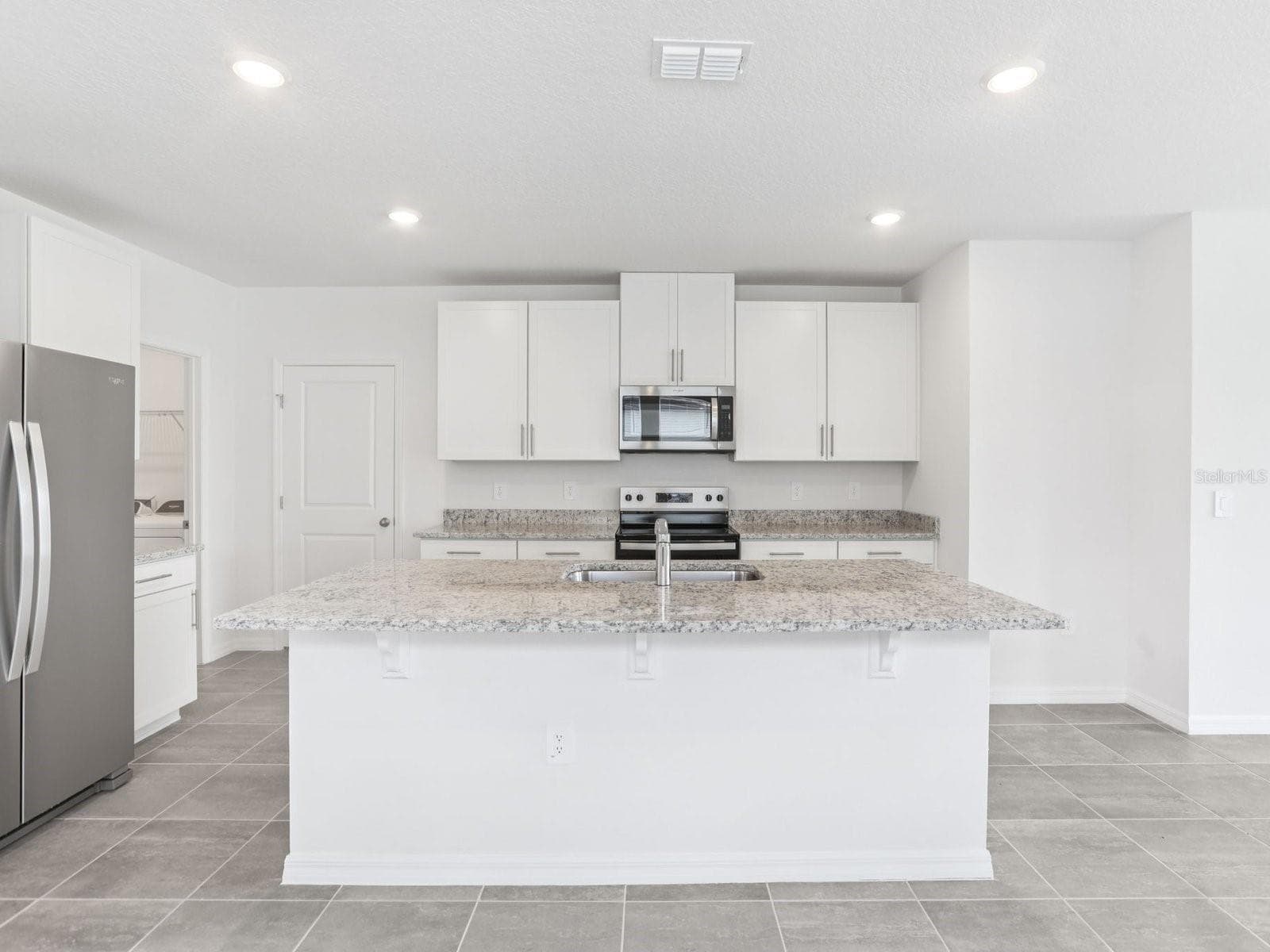 Photo is not of the actual home, but is an inspirational photo of builder’s model home and may depict options, furnishings, and/or decorator features that are not included - 11341 BELLEWOOD TER, PARRISH