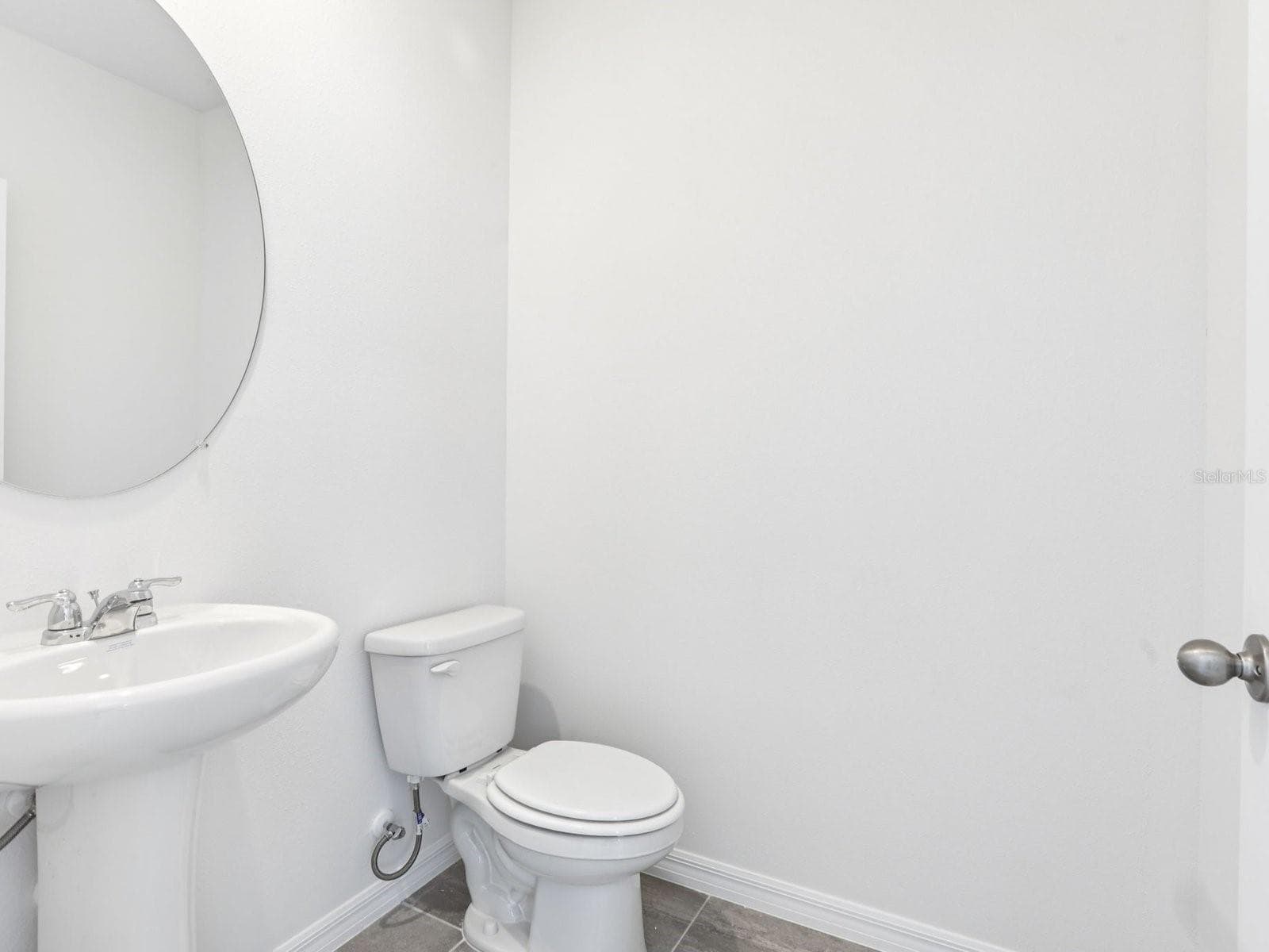 Photo is not of the actual home, but is an inspirational photo of builder’s model home and may depict options, furnishings, and/or decorator features that are not included - 11341 BELLEWOOD TER, PARRISH