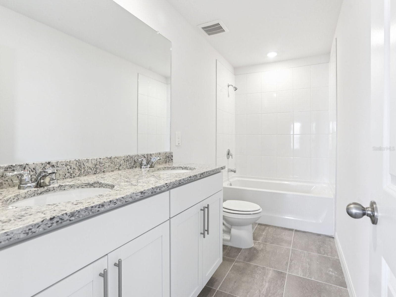 Photo is not of the actual home, but is an inspirational photo of builder’s model home and may depict options, furnishings, and/or decorator features that are not included - 11341 BELLEWOOD TER, PARRISH