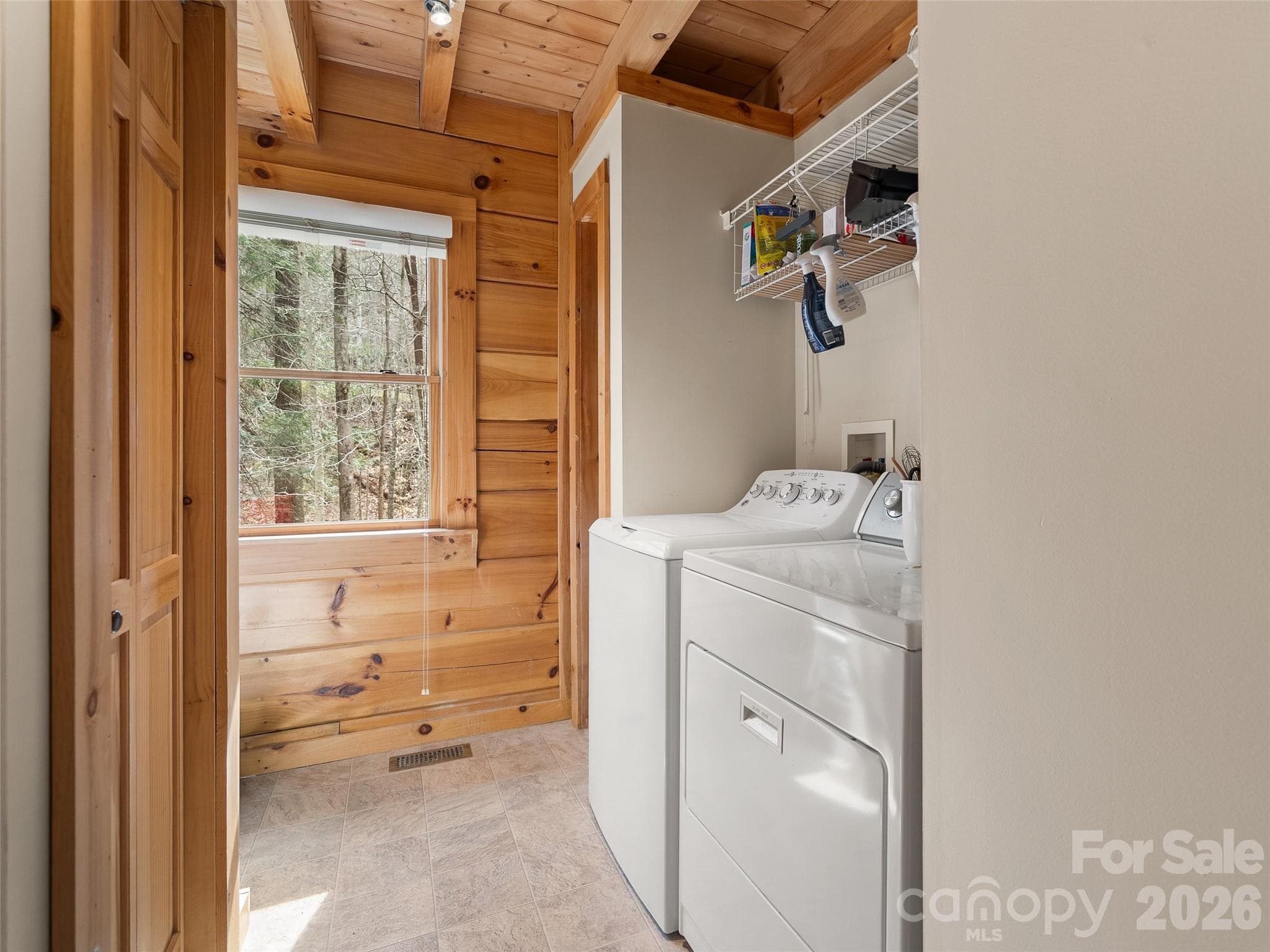 Laundry and extra pantry space on the main floor - 133 Smokemont Drive, Arden