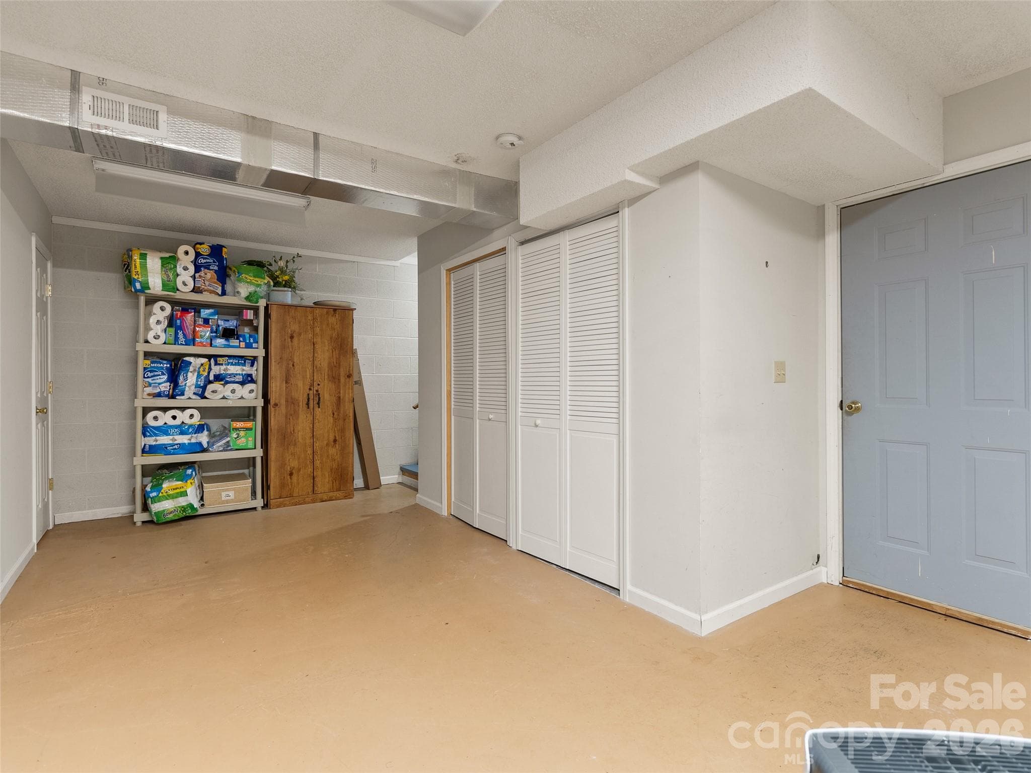 The heated basment provides more storage space and a half bath - 133 Smokemont Drive, Arden