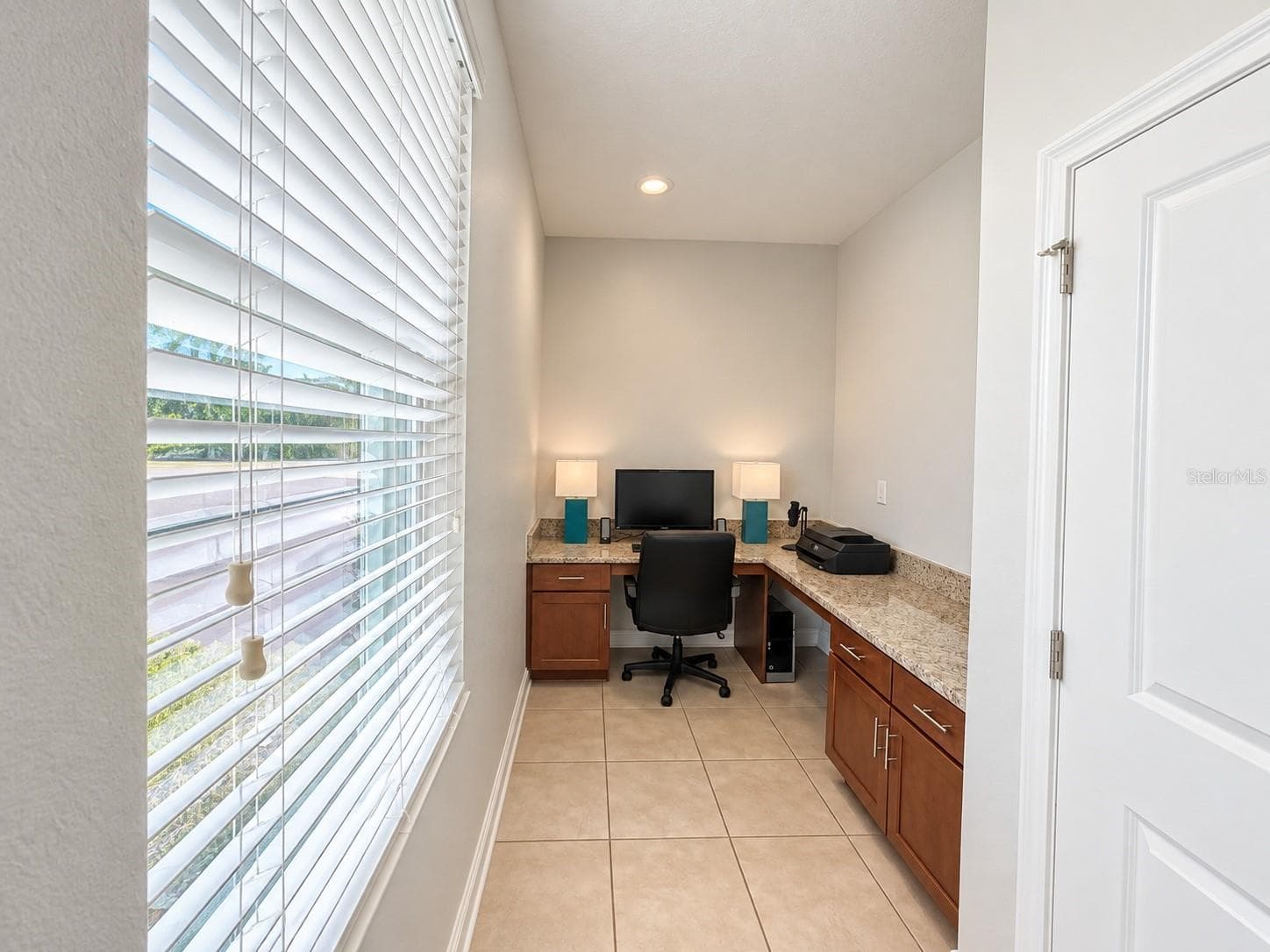Media/Office space conveniently located on the first floor. - 1516 BUNKER DR, DAVENPORT