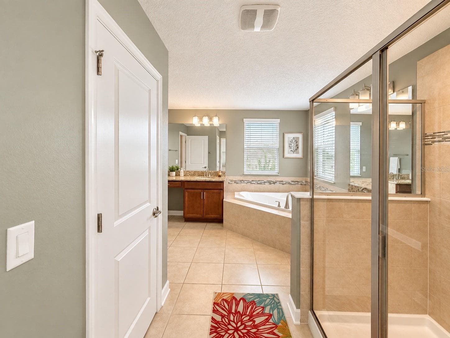 Generous vanity space provides plenty of room for storage and daily routines. - 1516 BUNKER DR, DAVENPORT