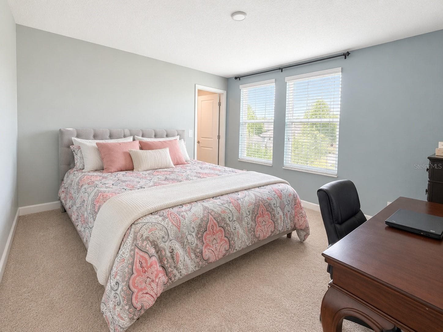 Comfortable fourth bedroom with excellent natural light and closet storage. - 1516 BUNKER DR, DAVENPORT