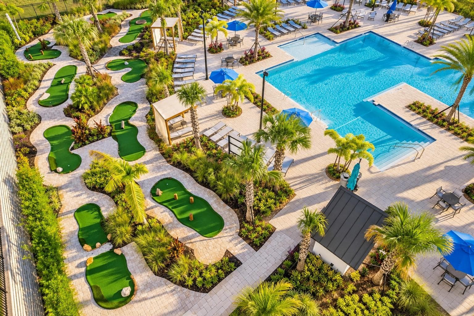 Residents enjoy access to community resort style pools. - 1516 BUNKER DR, DAVENPORT