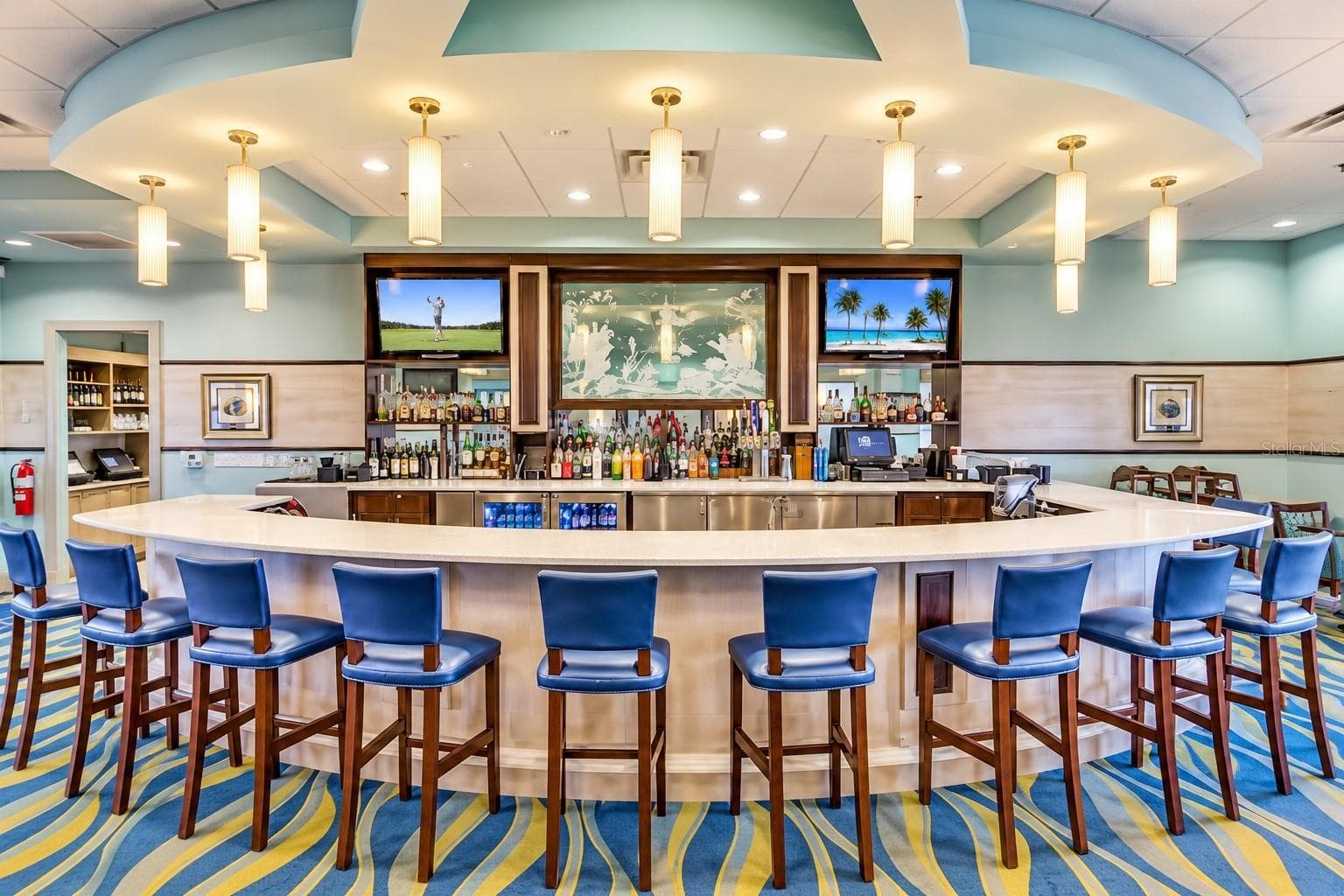 Spacious clubhouse bar offering comfortable seating and a relaxed resort-style atmosphere. - 1516 BUNKER DR, DAVENPORT