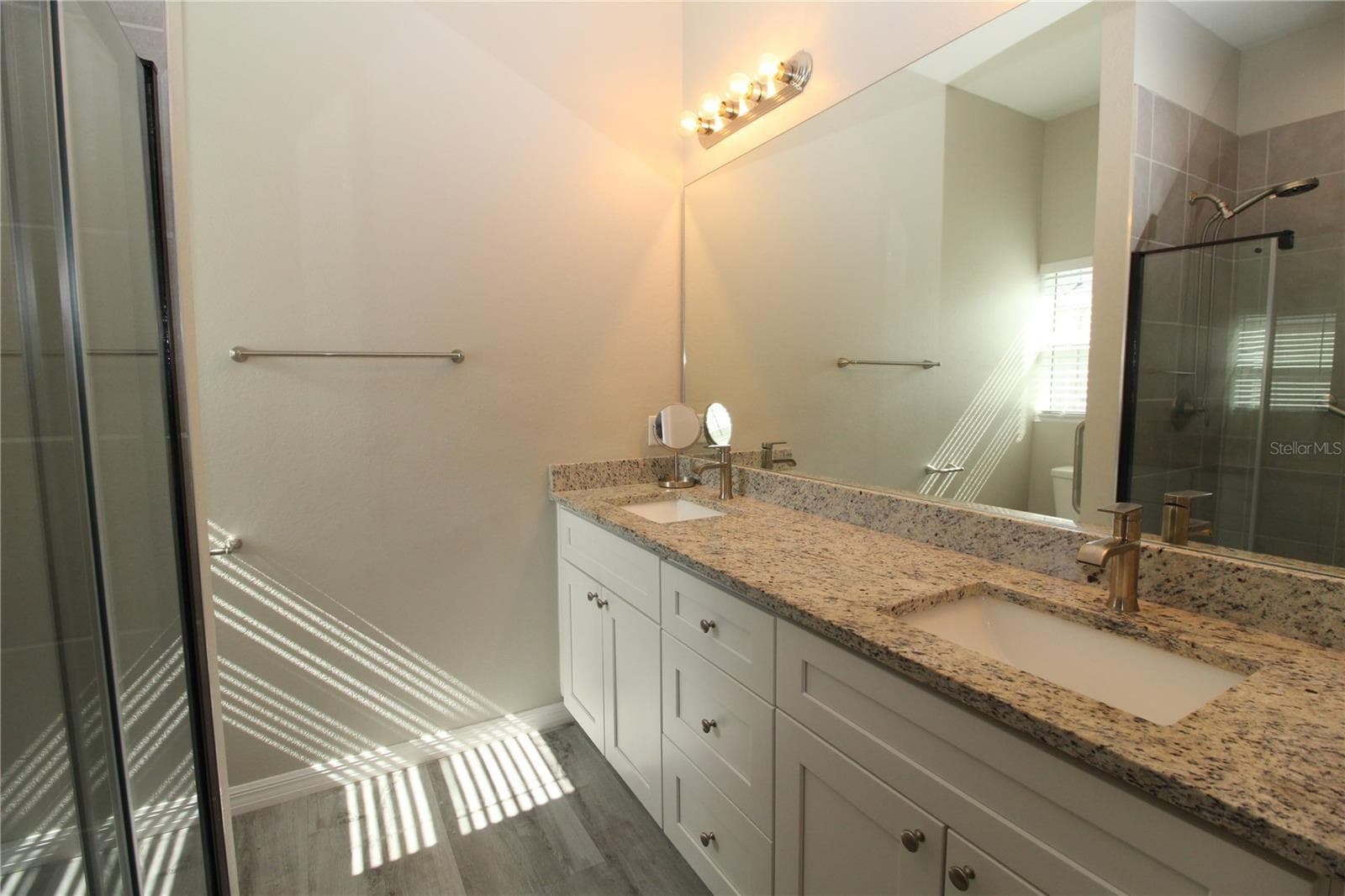 Primary Bathroom.... Long Vanity with dual sinks.... - 1888 FRANKLIN LN, NORTH PORT