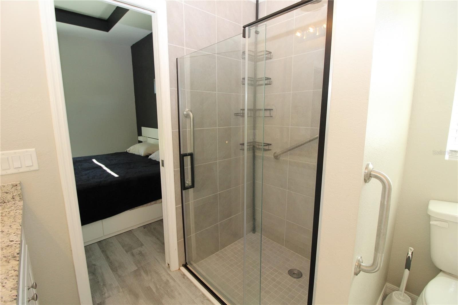 Primary Bathroom Walk-in Shower with brank new glass door enclosure... - 1888 FRANKLIN LN, NORTH PORT