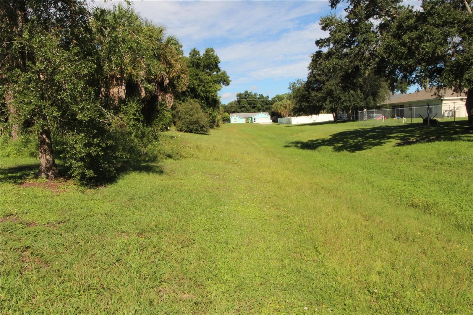 Greenbelt area behind home.. - 1888 FRANKLIN LN, NORTH PORT