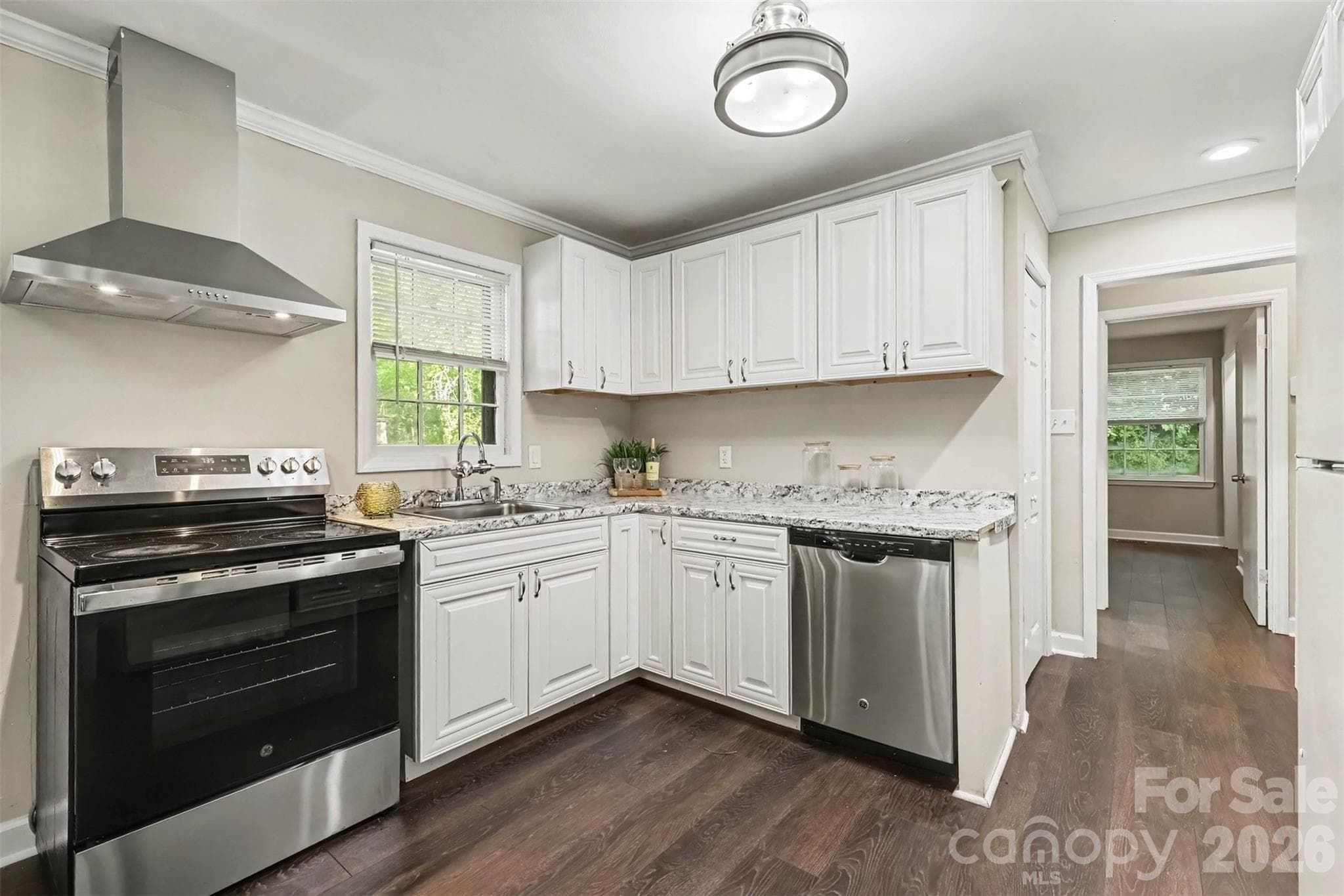 Stainless range and hood, crisp white cabinets. Ready to cook! - 502 Plantation Road, Lancaster