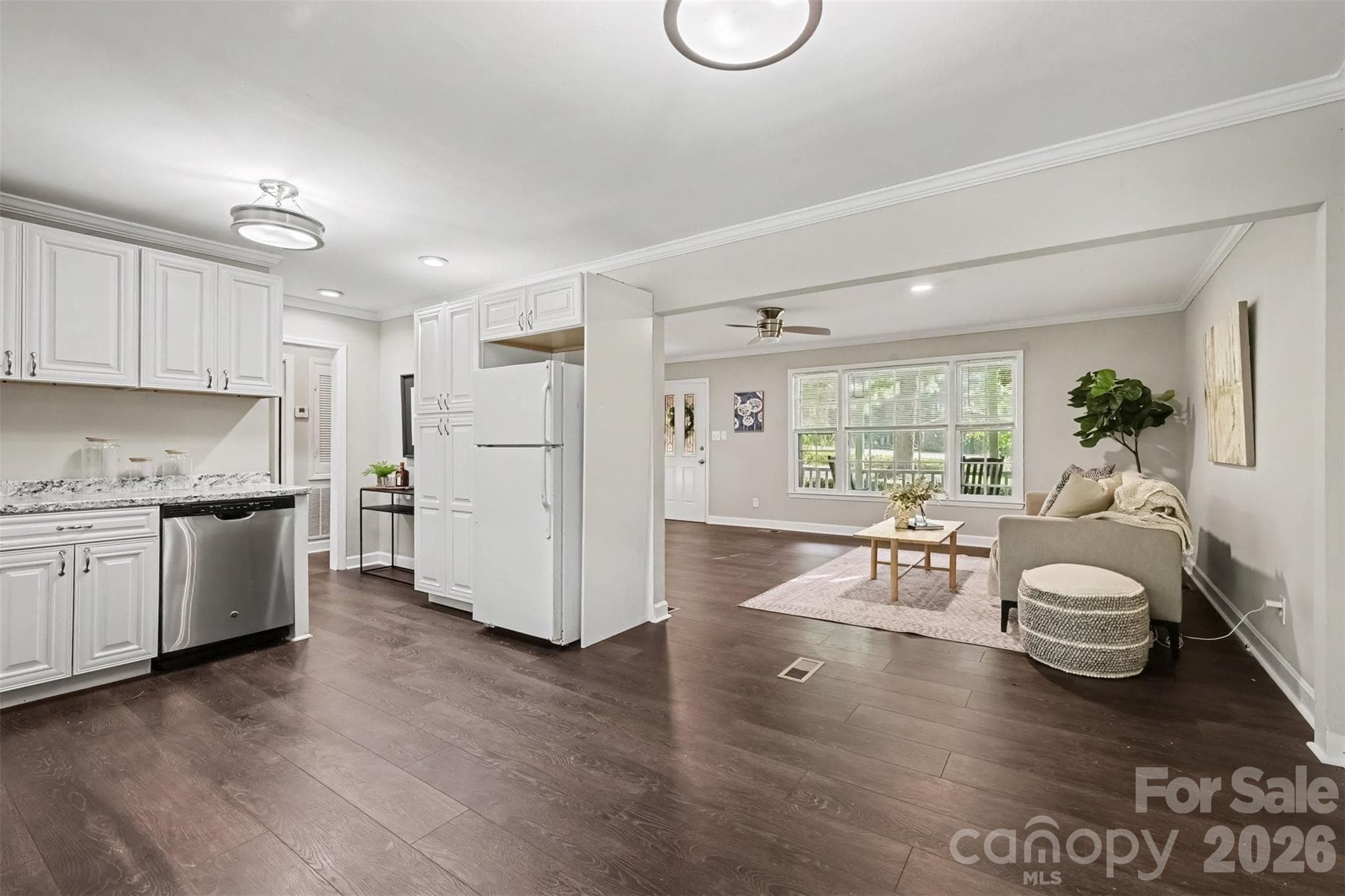 Kitchen with eat-in area opens to the living room, so the cook never misses out - 502 Plantation Road, Lancaster