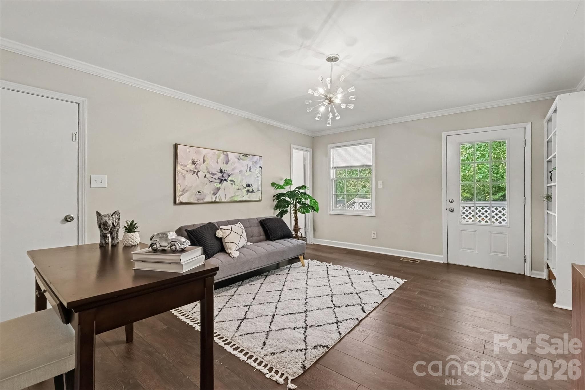 Crown molding, dark floors, and a family room that does it all - 502 Plantation Road, Lancaster