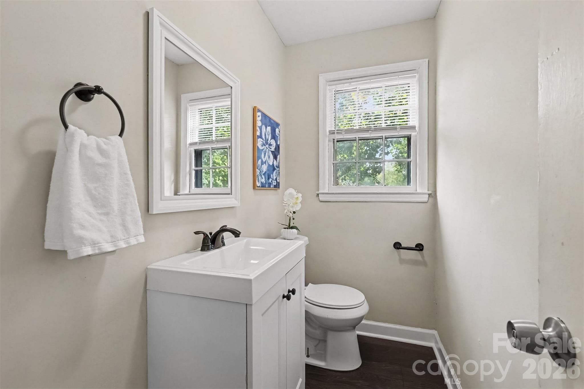Guest-friendly half bath with a bright window - 502 Plantation Road, Lancaster