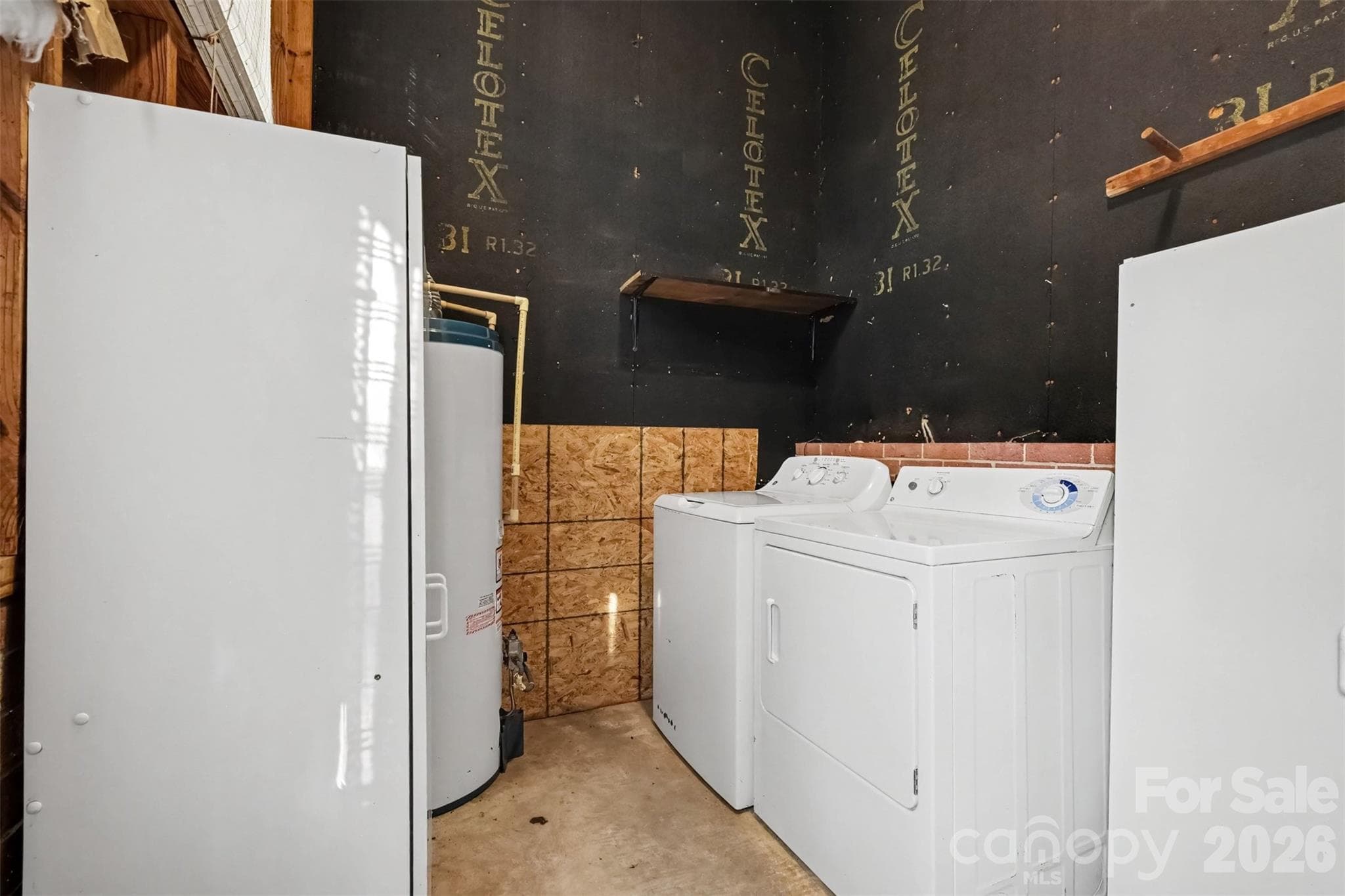 Laundry with a handy shelf. Right off the Family Room with access to the side yard. - 502 Plantation Road, Lancaster