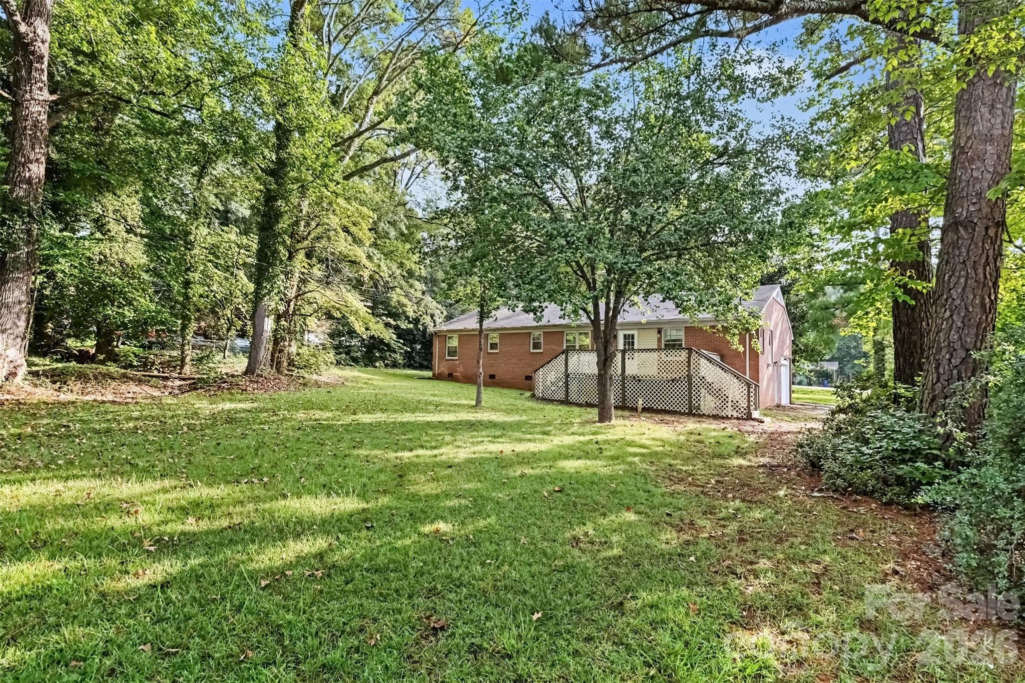 Deck overlooks the expansive back yard. Plenty of lawn to play, garden, or just breathe - 502 Plantation Road, Lancaster