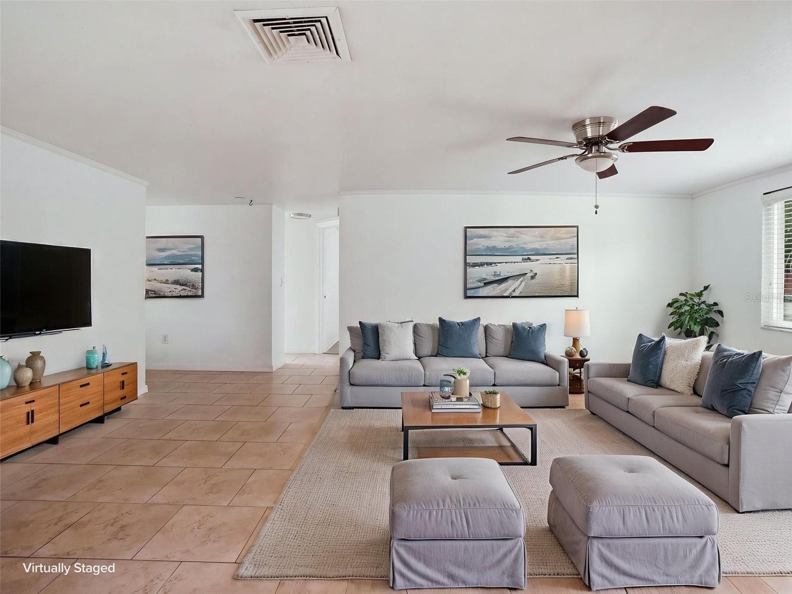 Living room - virtually stages - 8502 ARROWHEAD DR, HUDSON
