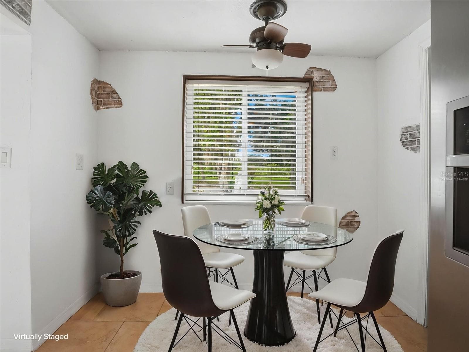 Eat in area - virtually staged - 8502 ARROWHEAD DR, HUDSON