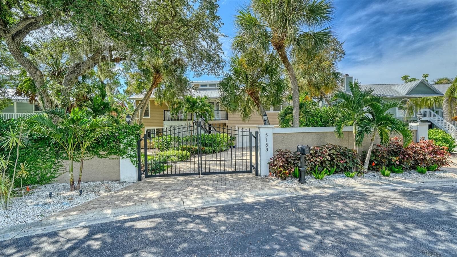 Gated entrance and privacy wall create a wonderful sense of seclusion. - SARASOTA