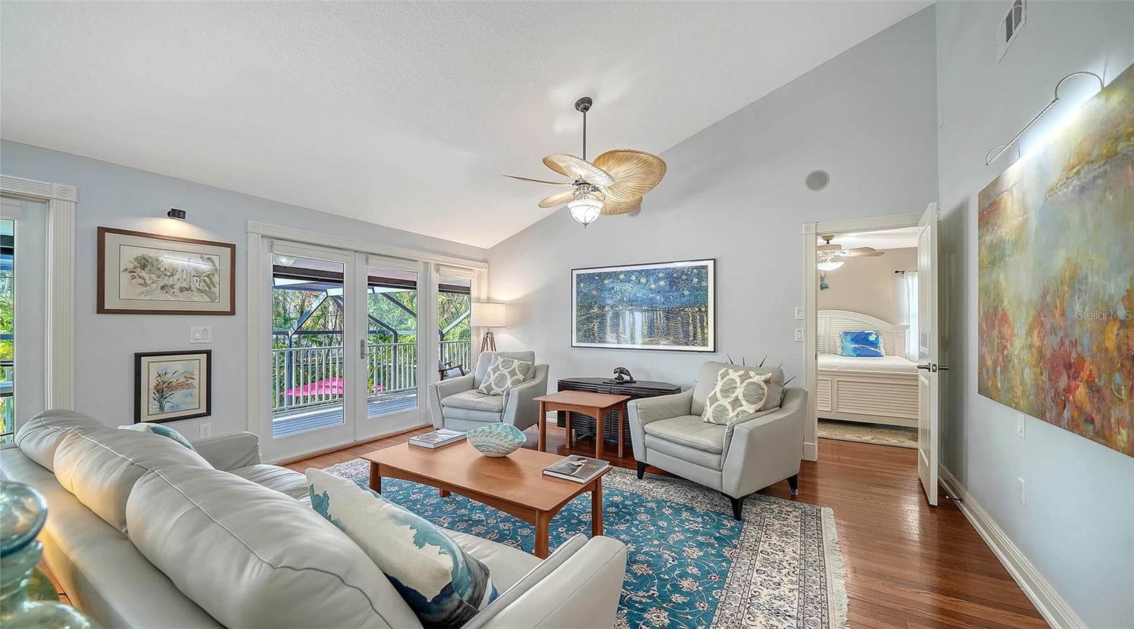 Bright and inviting main living area with vaulted ceilings and abundant natural light. - SARASOTA
