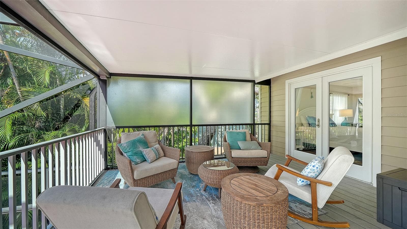 Private screened balcony off the primary suite. - SARASOTA