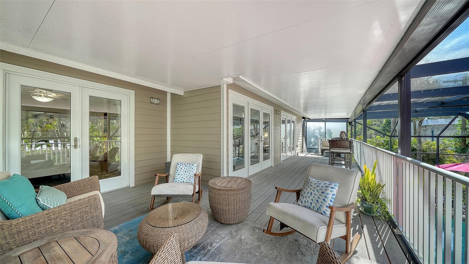 Additional view of the primary suite and its direct access to outdoor living space. - SARASOTA