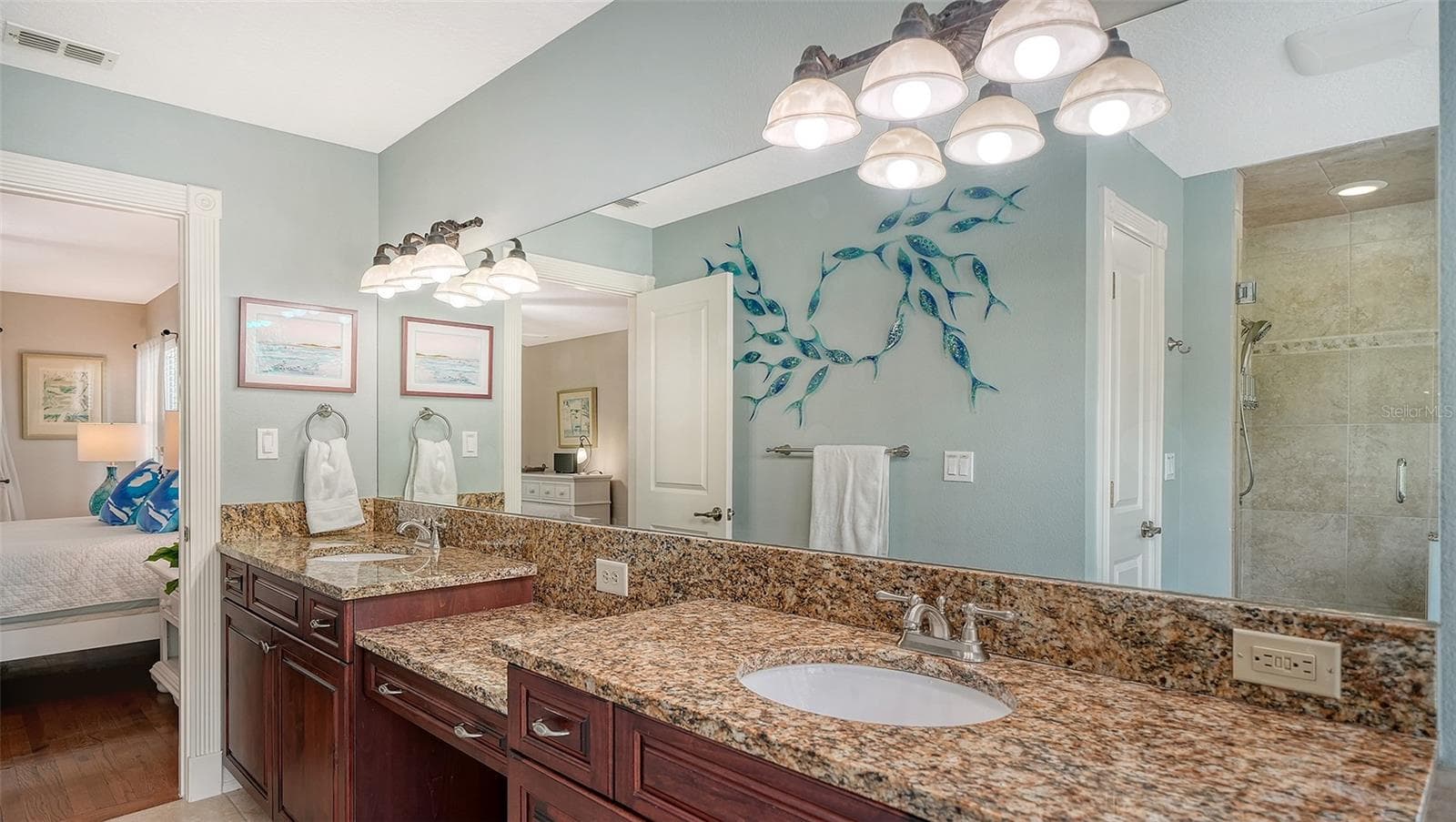 Dual vanity provides plenty of counter and storage space. - 5188 SIESTA WOODS DR, SARASOTA