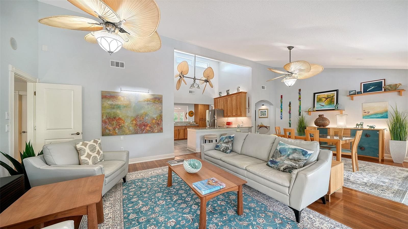 Open living and dining areas create an easy flow for everyday living and entertaining. - SARASOTA