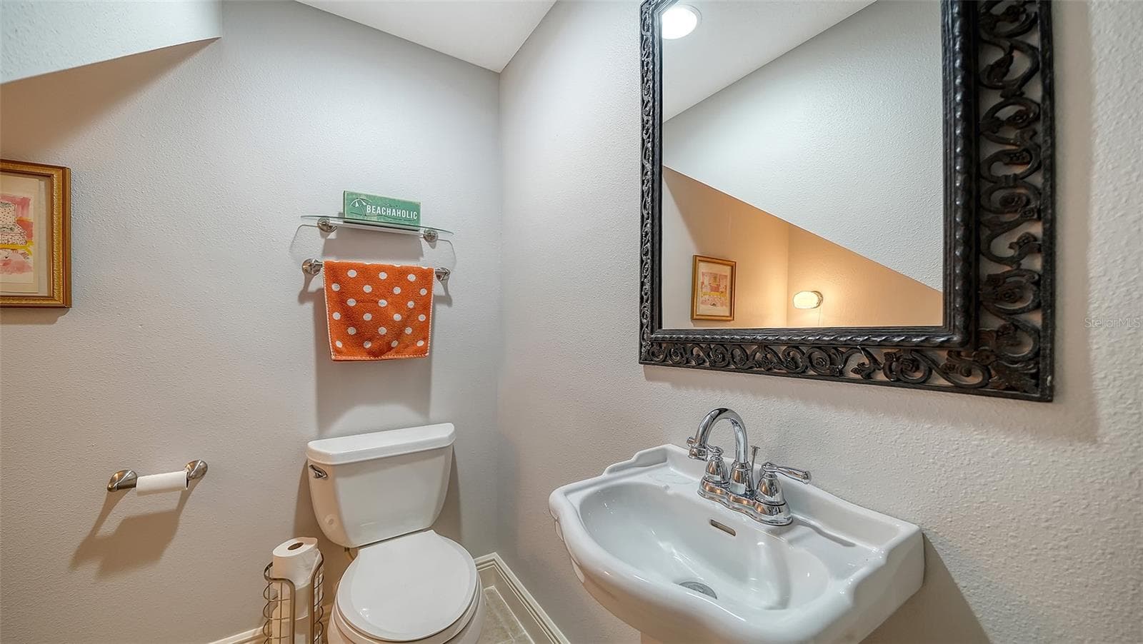 Convenient half bath. - 5188 SIESTA WOODS DR, SARASOTA