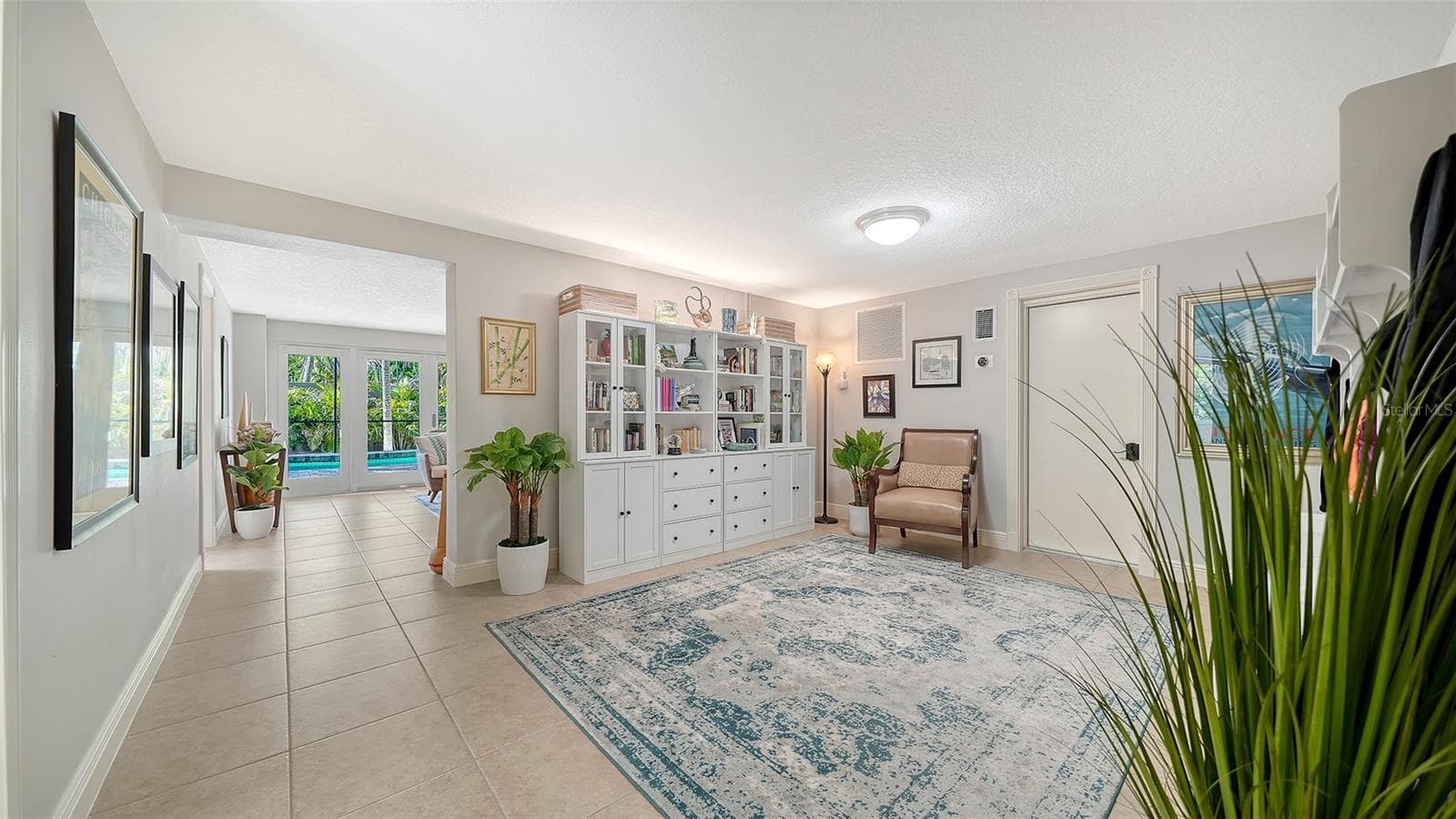 Expansive bonus space with built-in cabinetry and tremendous flexibility. - SARASOTA